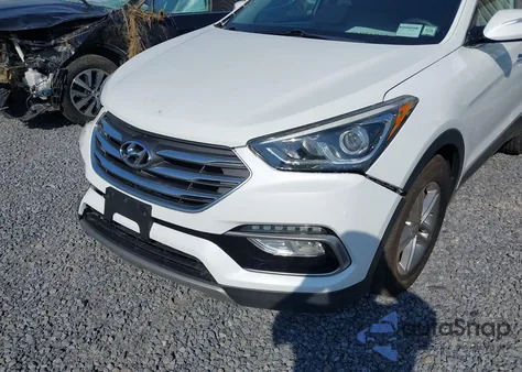 2018 Hyundai Santa Fe Sport 2.4L z USA, uszkodzony, nr VIN 5NMZUDLB5JH054699